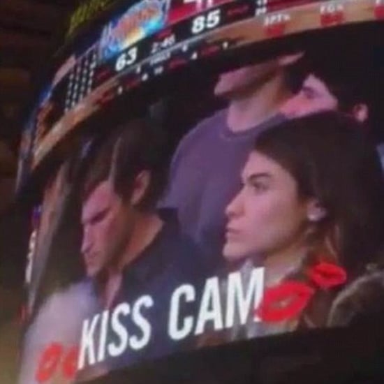 Woman Kisses Stranger Next to Her on Kiss Cam