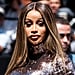 Cardi B's Outfits in the "Point Me 2" Music Video