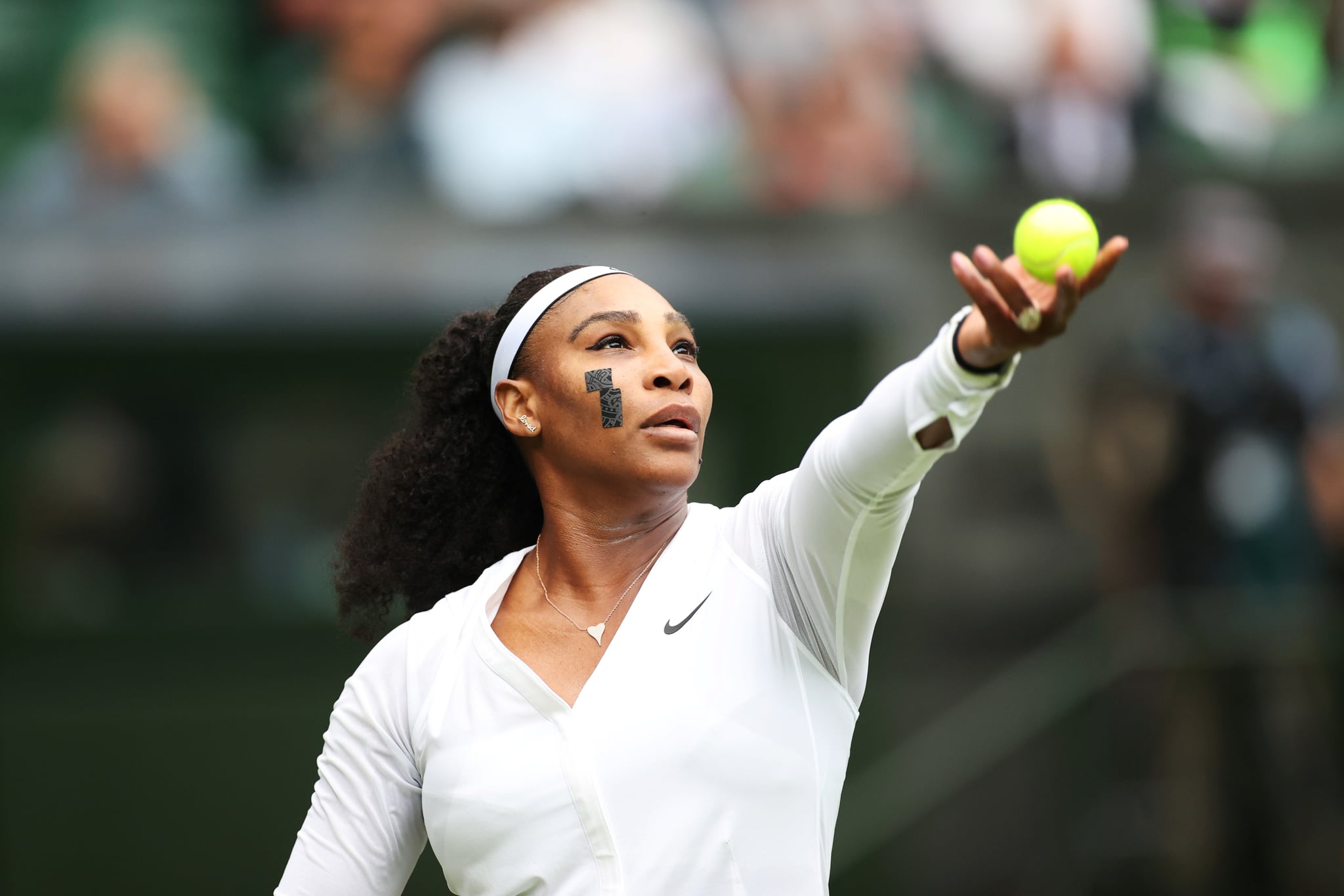 Serena Williams serves during the women's singles first round match between Serena Williams of the United States and Harmony Tan of France at Wimbledon Tennis Championship in London, Britain, on June 28, 2022. (Photo by Li Ying/Xinhua via Getty Images)