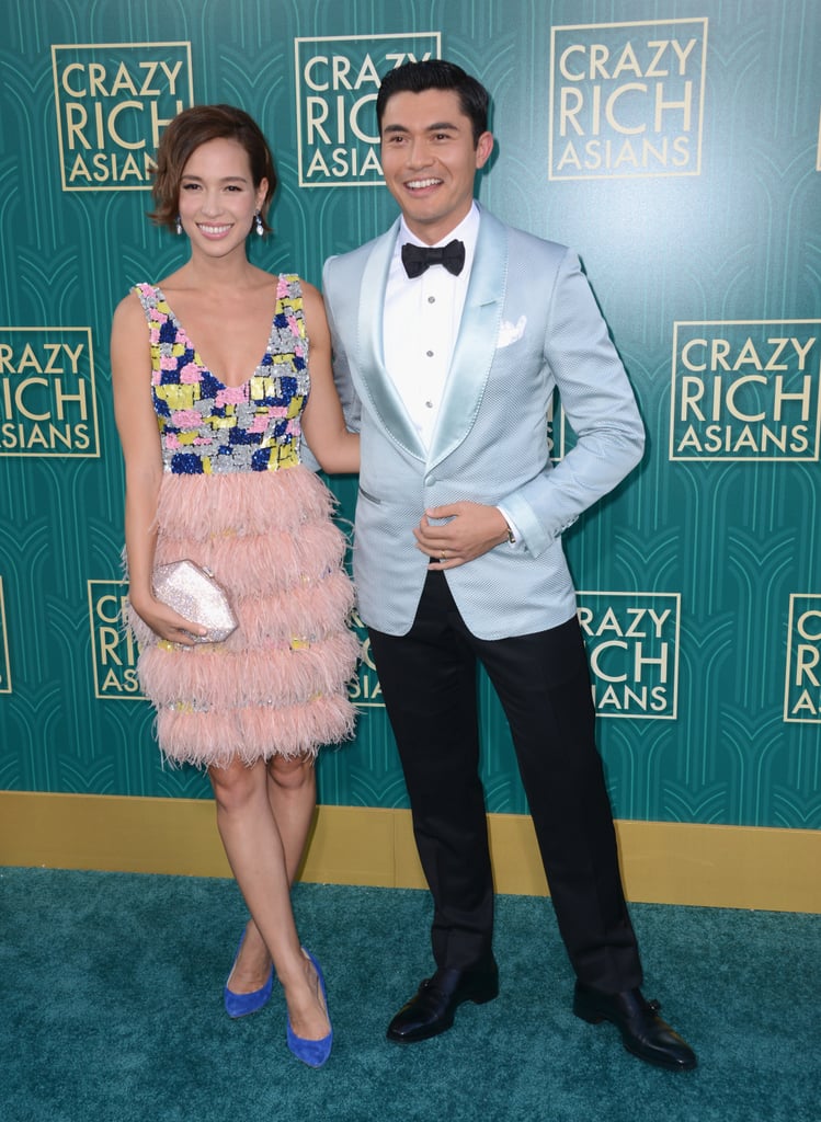 Pictured: Henry Golding and his wife Liv Lo