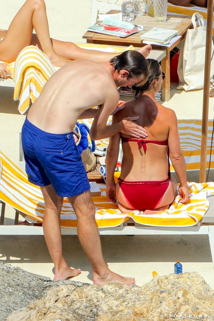 James helped Pippa apply sunscreen.