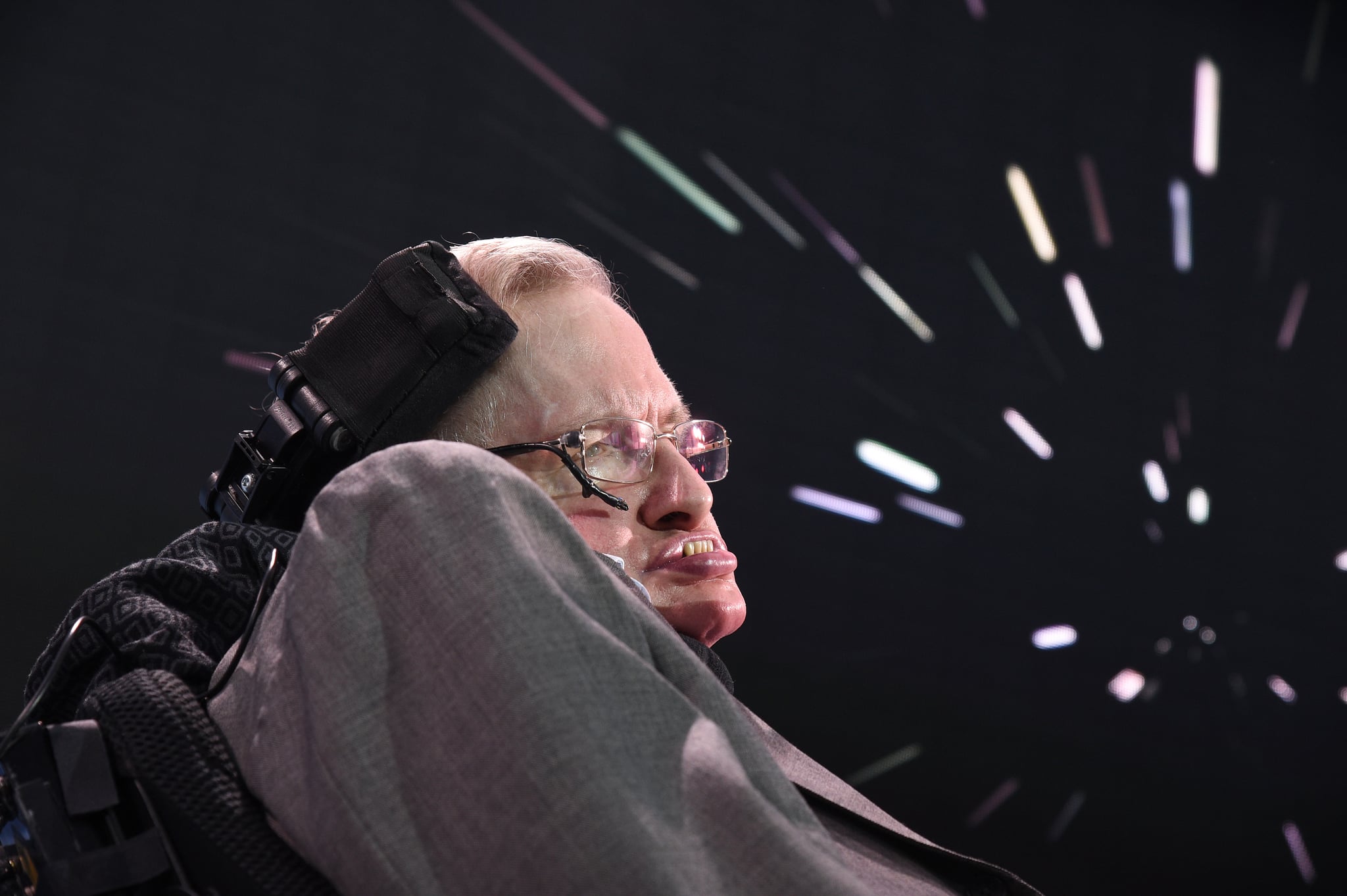 NEW YORK, NEW YORK - APRIL 12:  Stephen Hawking, CH, CBE, FRS, Dennis Stanton Avery and Sally Tsui Wong-Avery Director of Research, University of Cambridge speaks on stage as he and Yuri Milner host press conference to announce Breakthrough Starshot, a new space exploration initiative, at One World Observatory on April 12, 2016 in New York City.  (Photo by Bryan Bedder/Getty Images for Breakthrough Prize Foundation)