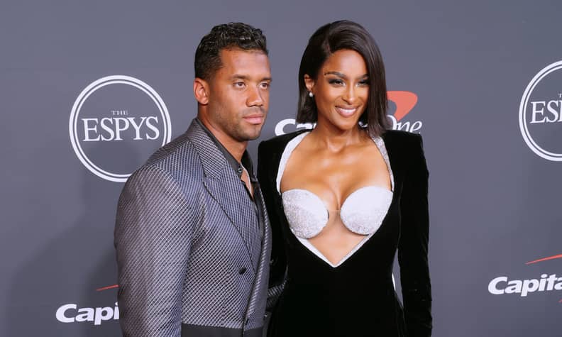 Ciara turns heads with plunging dress and silver bra on ESPYs red
