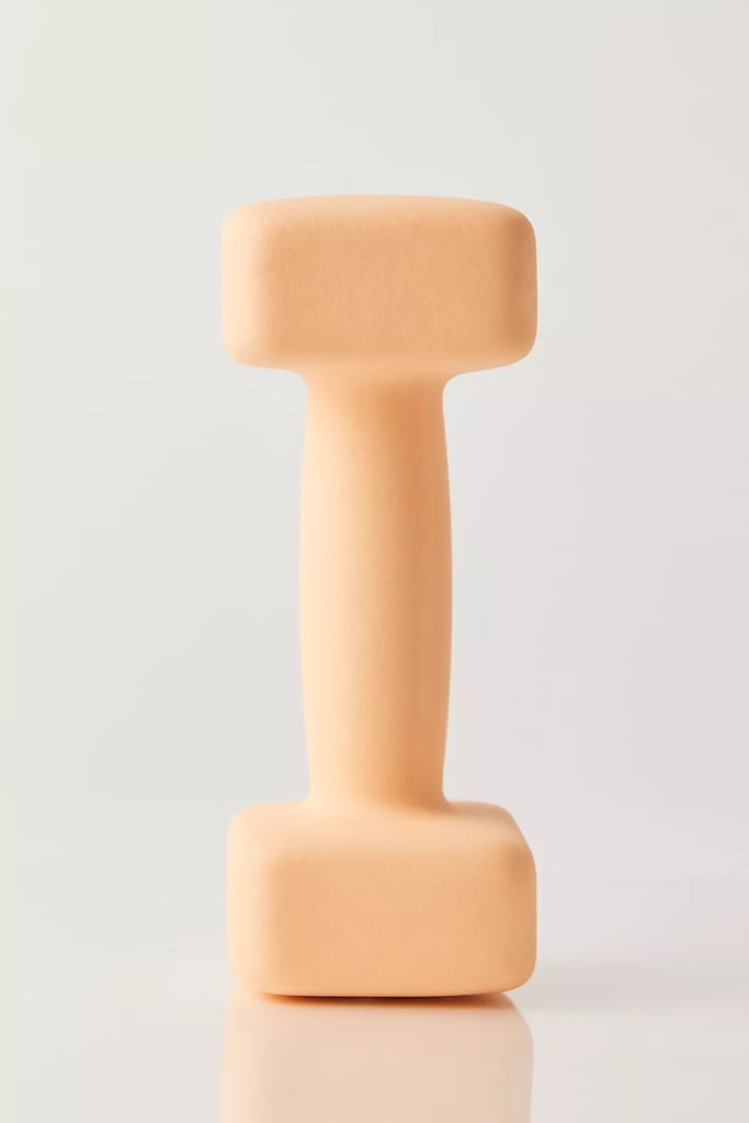 Gaiam x Free People Movement 8lb Dumbbell ($26)
One way to spark joy and motivation to pick up a dumbbell? Add bright, fun colors such as this peach sorbet option from Free People. Every weight in the collection comes in a different shade so you can quickly identify what you need to reach for.
