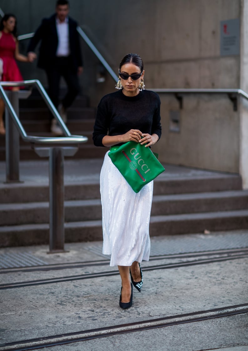 For a Classy Ensemble, Style a Sequined Skirt With a Black Sweater