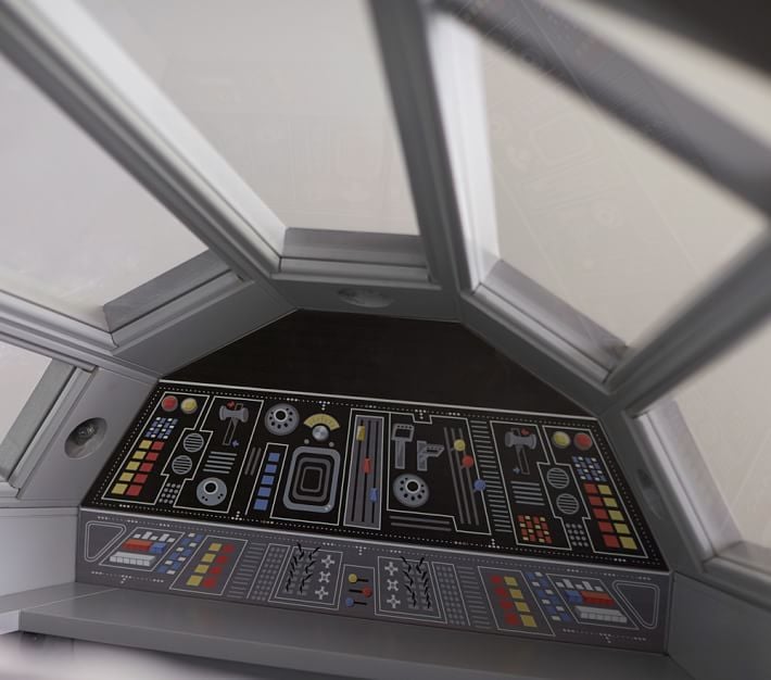 Inside the bed, there's a control center suited for Han and Chewie.
