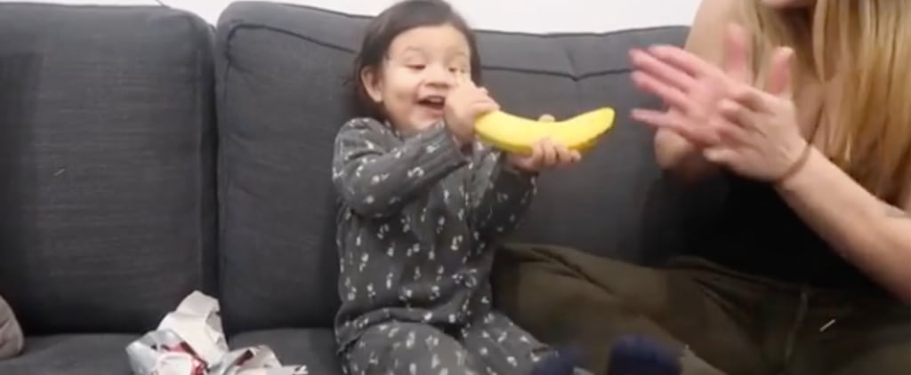 Please Watch This 2-Year-Old Crack Up When She Receives a Banana For Christmas