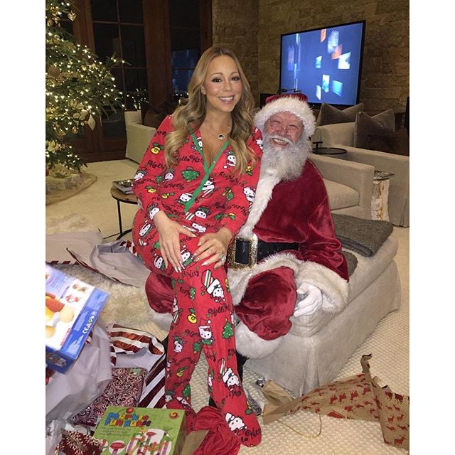Mariah Carey cozied up to Santa on Christmas.