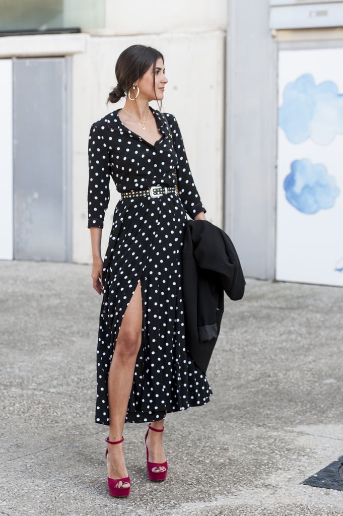 black and white polka dot dress with red shoes