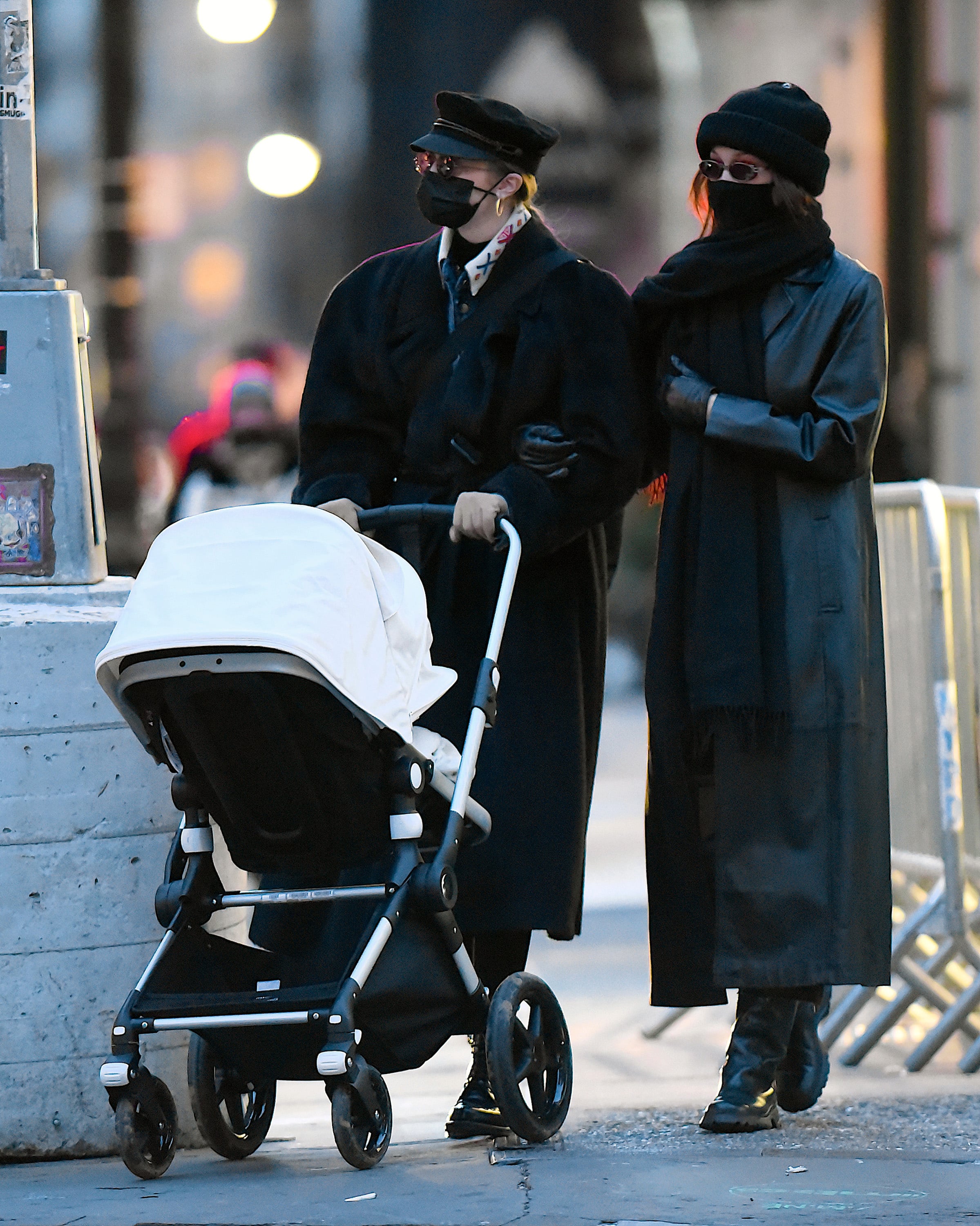 Gigi Hadid takes her daughter out for a stroll during a lunch outing with  Bella Hadid