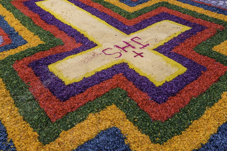 Semana Santa, or Holy Week, is celebrated in a colorful fashion, by creating beautiful street carpets made of sand and sawdust and decorated with plants and flowers, called alfombras. On Palm Sunday, 