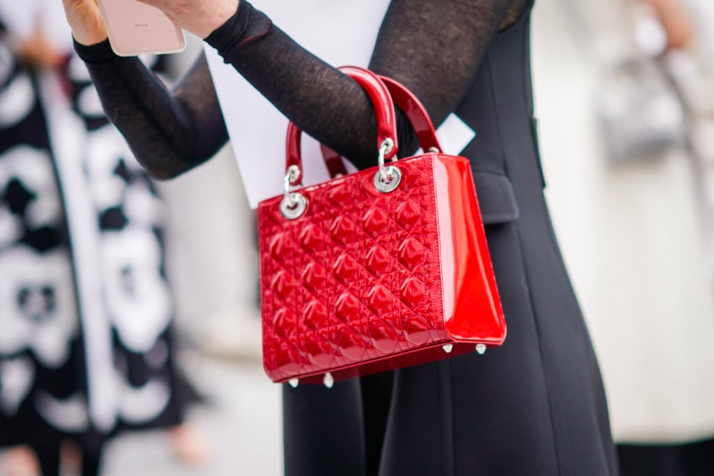 If you want to ease your way into the trend, reach for a patent accessory.