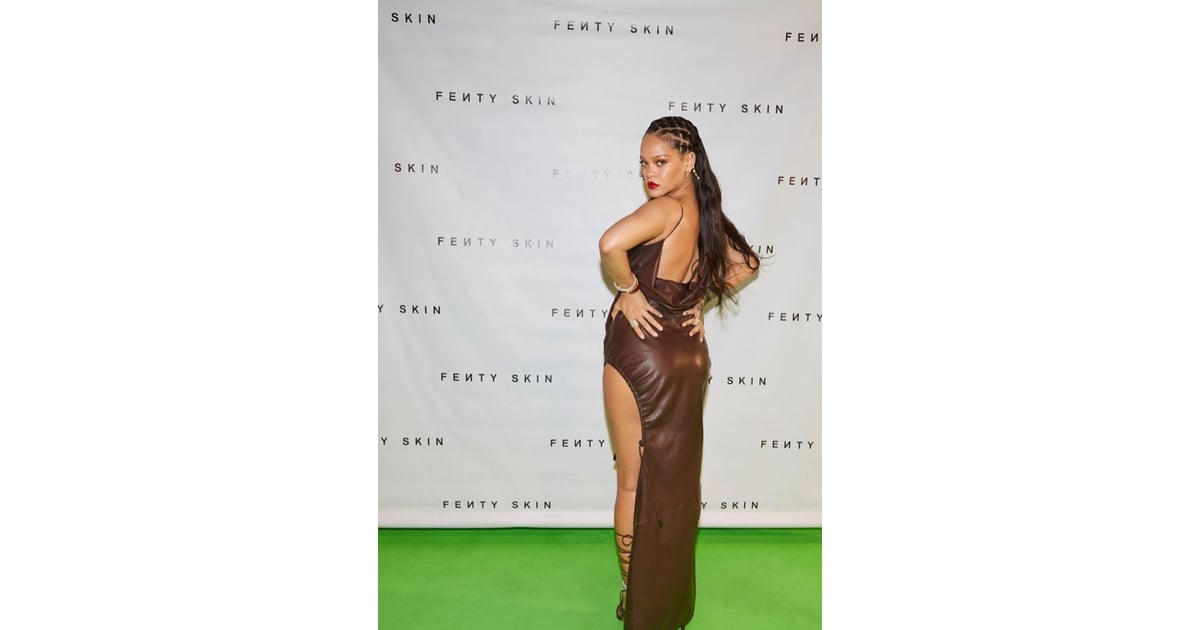 Rihanna puts on a leggy display in sizzling brown leather dress