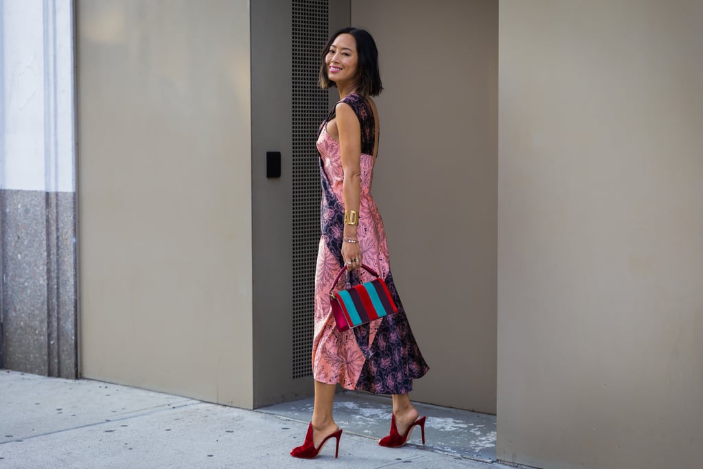 You don't have to wear your brightest pinks with your brightest reds. Feel free to go for a darker tint with a pair of burgundy mules like Aimee Song did.
