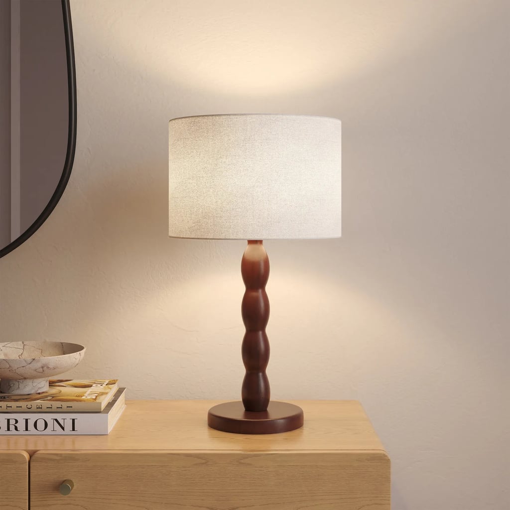 Article Sloane Table Lamp ($119)
My favorite way to bring fresh energy into a room is with a new table lamp. It instantly makes a space feel cozy while also having a significant purpose. I love how this tall lamp feels classic and organic thanks to the curved base. If you want a bolder look, swap out the linen lampshade for a fun design.