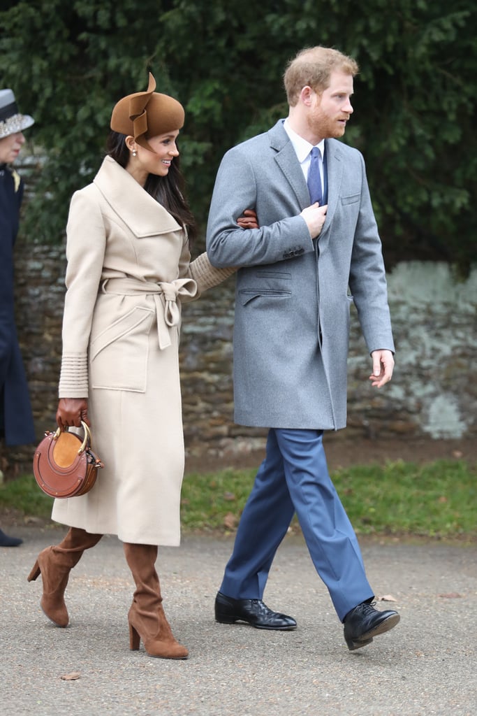 On Christmas Day in 2017, Meghan wore a Sentaler wrap coat with trendy accessories, including a Chloé bag and the iconic Stuart Weitzman Highland Boot.