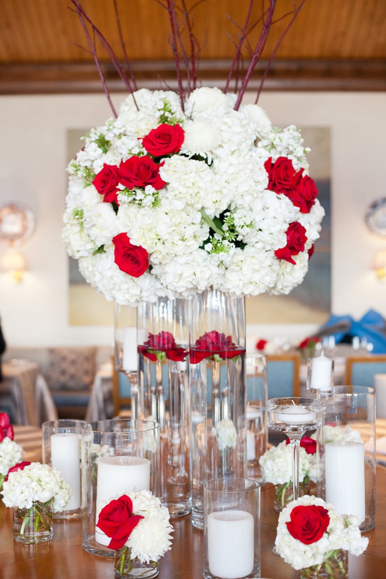 White floral arrangements with hints of red look just like lace from afar.