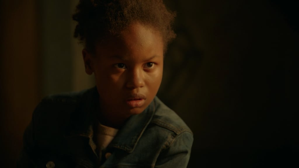 Listen, I know it's a stretch. Emily is a pretty common name. Plus, the character doesn't look at ton like Lee or her other daughter, Flora. But hey, there's a lot of evidence that could support this theory.
Lee said she had Emily when she was 17. We know the real-life events Roanoke take place in 2014. And though Lee never said her age, you could guess she's in her mid-to-late 30s. If she had Emily in the mid-to-late '90s, Emily would theoretically be in her early 20s by the time Apocalypse starts in 2019. And judging by the portrait, it kind of matches up. And, I mean, if Lee had her at 17, we're assuming Emily has a different father, which might explain the discrepancies in resemblance to Flora and even Lee.
All I'm saying is, we never got any sort of closure on that story, and it definitely stuck out as something important when Roanoke aired. And it is strange that there's still some mystery surrounding Apocalypse's Emily. Is it a reach? Completely. But stranger things have happened on American Horror Story.
As for what kind of significance this connection to Roanoke might have? That remains to be seen. You have to admit, though: it would be another cool addition to the tangled web of connections woven by the show so far.