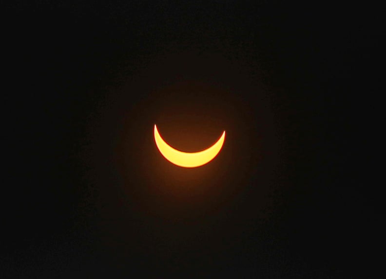 With the help of special glasses, a photo of the solar eclipse in Miami, FL.