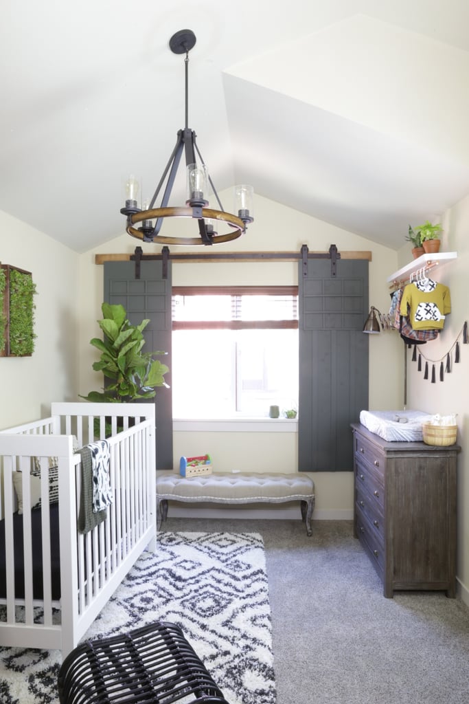 Monica hung a Black and Wood Rustic Clear Glass Candle Chandelier ($249) overhead to create a cozy, inviting feel.