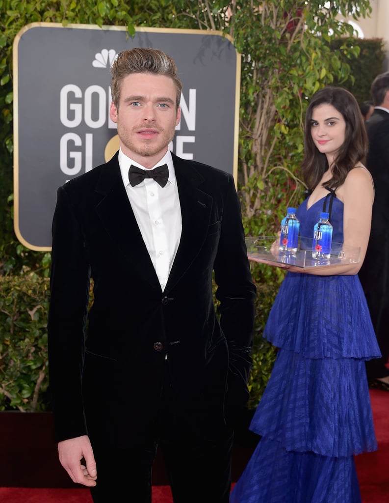 Girl Posing With Fiji Water on 2019 Golden Globes Red Carpet