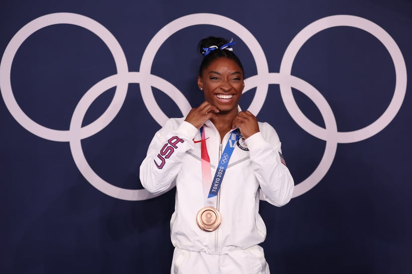 TOKYO, JAPAN - AUGUST 03: Simone Biles of Team United States poses with the bronze medal following the Women's Balance Beam Final on day eleven of the Tokyo 2020 Olympic Games at Ariake Gymnastics Centre on August 03, 2021 in Tokyo, Japan. (Photo by Jamie