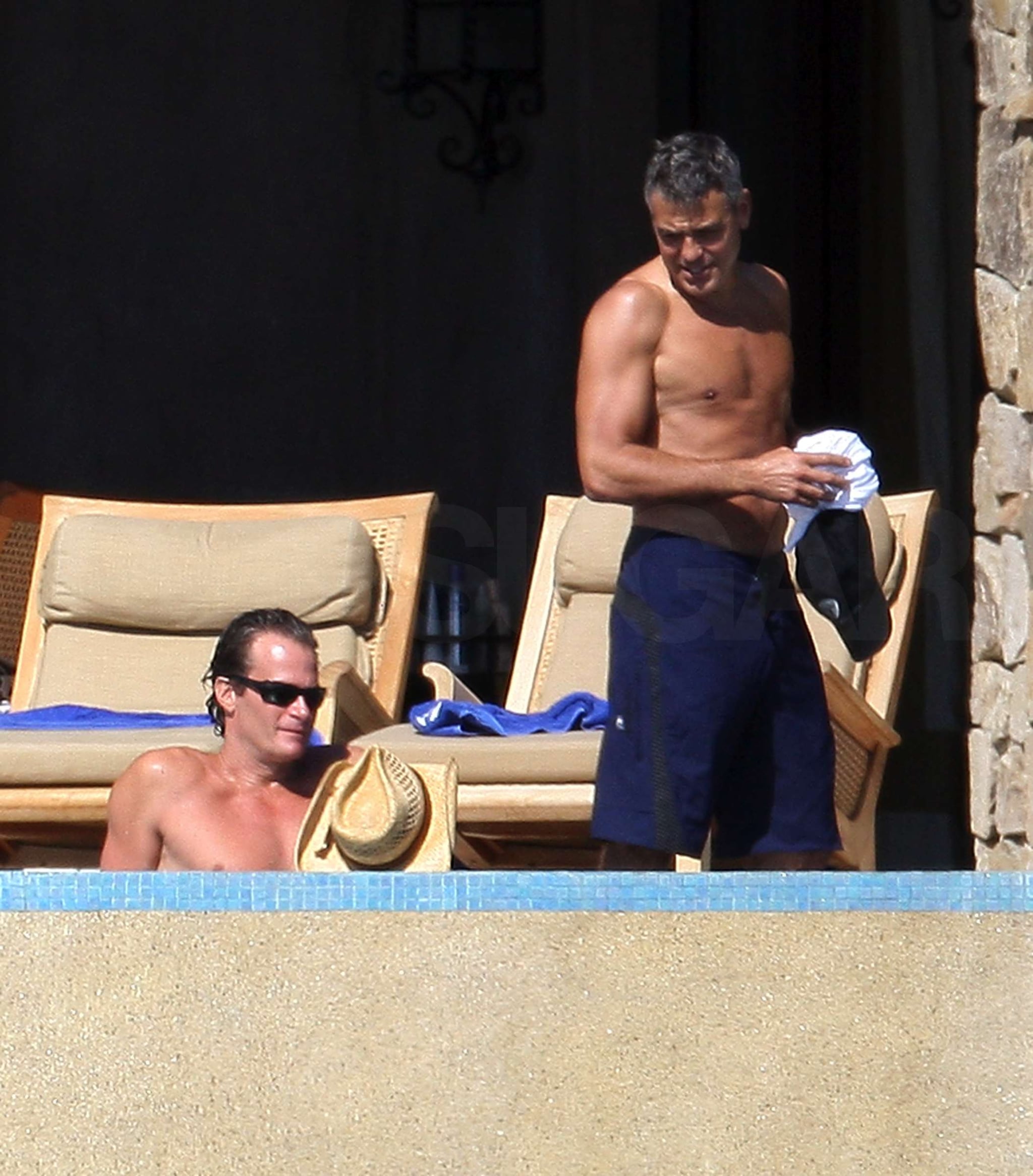 Shirtless Clooney Brings a Happy 09