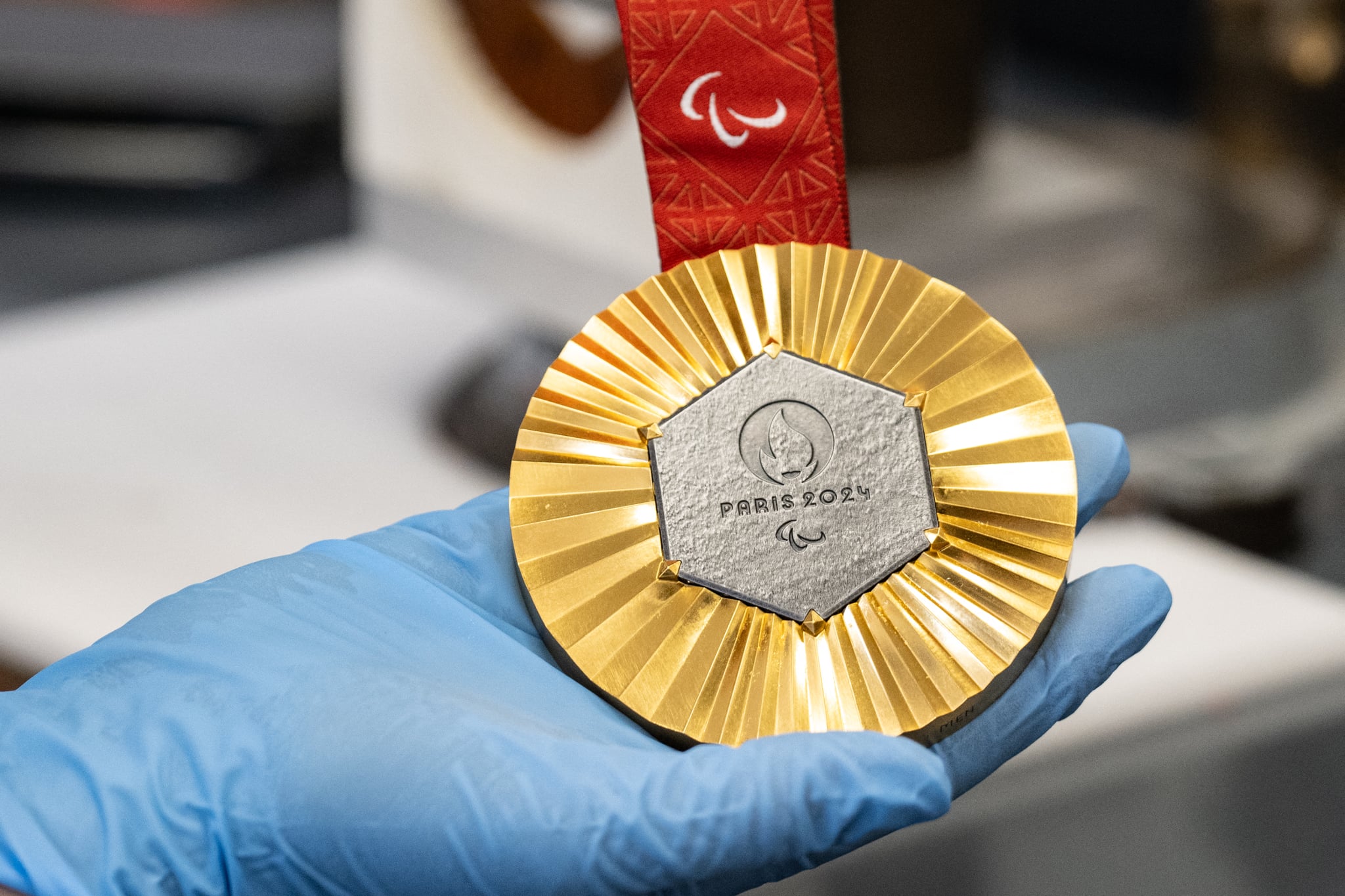 This photograph shows a golden medal displayed in the workshops of La Monnaie de Paris, in Paris on June 25, 2024, ahead of the upcoming 2024 Paris Olympic and Paralympic Games. (Photo by BERTRAND GUAY / AFP) (Photo by BERTRAND GUAY/AFP via Getty Images)