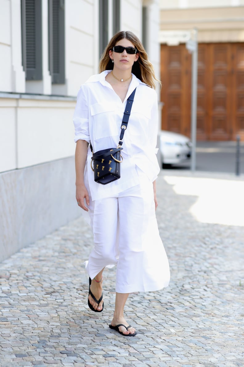 In All White With Flip-Flops