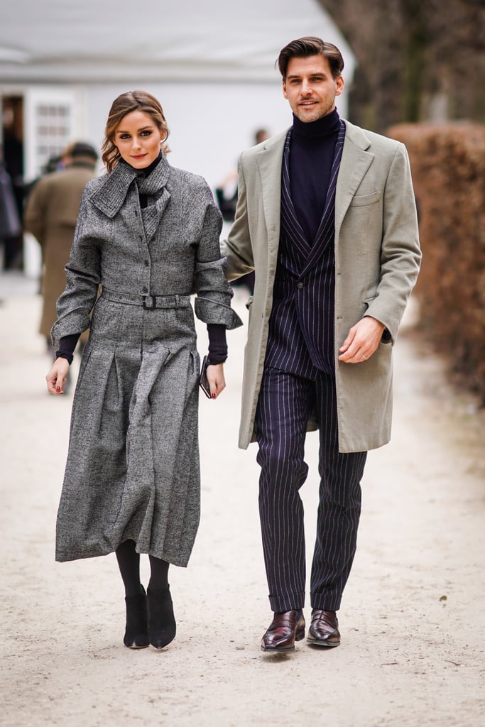 Olivia and her husband, Johannes Huebl, coordinated in gray outside the Dior show.