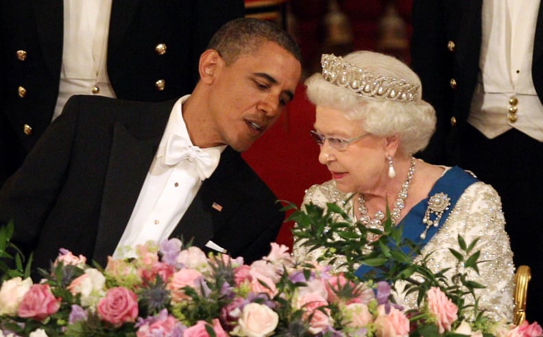 Sharing a secret with Her Majesty during a 2011 official visit to England.