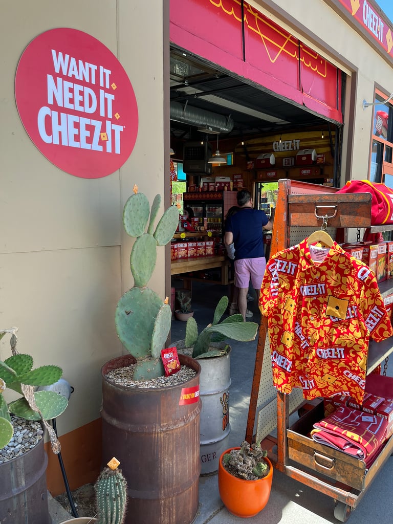 The brand's latest slogan — "Want it. Need it. Cheez-It." — can be found throughout in the form of signage and stickers.