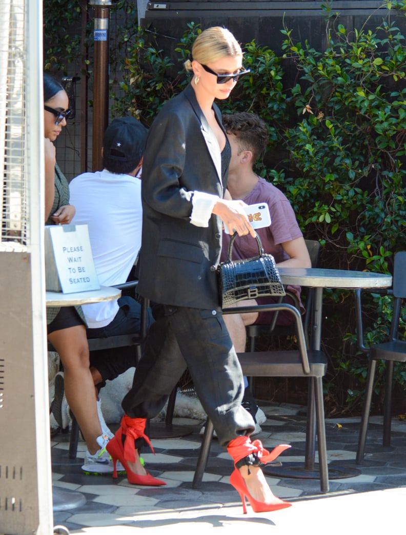 Hailey Baldwin Wearing Red Heels in LA