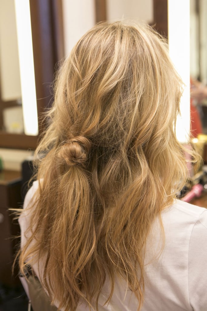 Now your hair should look like this, with a loose knot in the middle of your hair. It might look awkward, but you'll need it for later in the look.