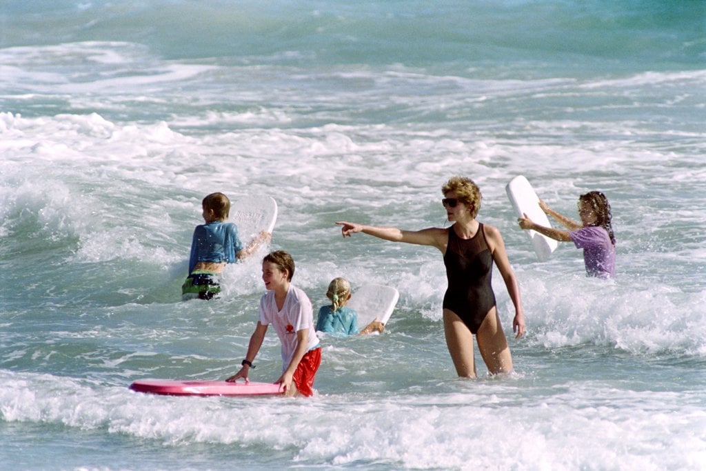 When she looked like a total Baywatch babe while still taking charge of the kids.