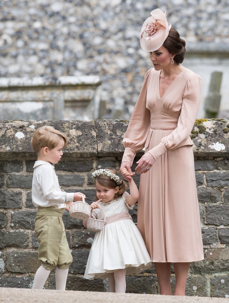 Kate helped guide her little ones at her sister's wedding in 2017.