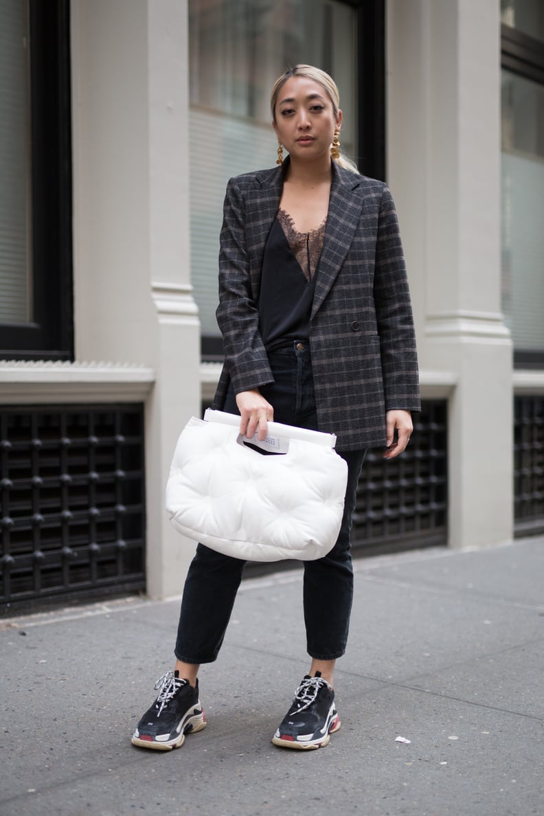 With a Delicate Camisole, a Blazer, a Fluffy Handbag, and Dad Sneakers