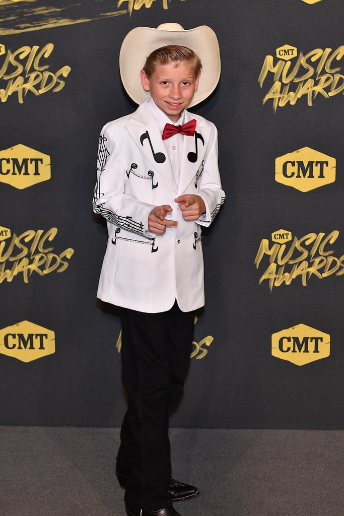 When he walked the CMT Music Awards red carpet in June, Mason said "See ya!" to his blue jeans and belt buckle, wearing a customized white suit jacket and black pants.