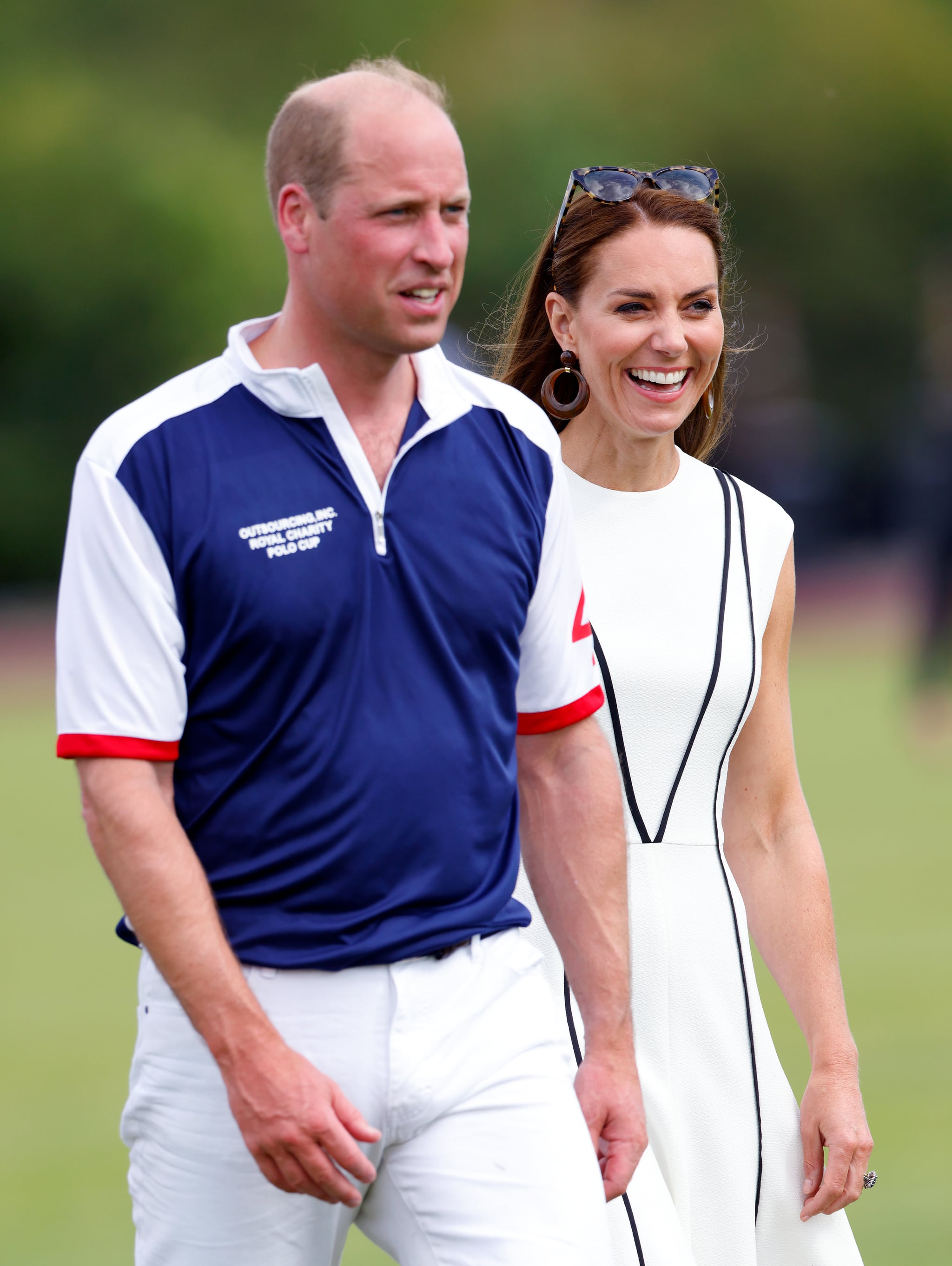 WINDSOR, UNITED KINGDOM - JULY 06: (EMBARGOED FOR PUBLICATION IN UK NEWSPAPERS UNTIL 24 HOURS AFTER CREATE DATE AND TIME) Prince William, Duke of Cambridge and Catherine, Duchess of Cambridge attend the Out-Sourcing Inc. Royal Charity Polo Cup at Guards Polo Club, Flemish Farm on July 6, 2022 in Windsor, England. (Photo by Max Mumby/Indigo/Getty Images)