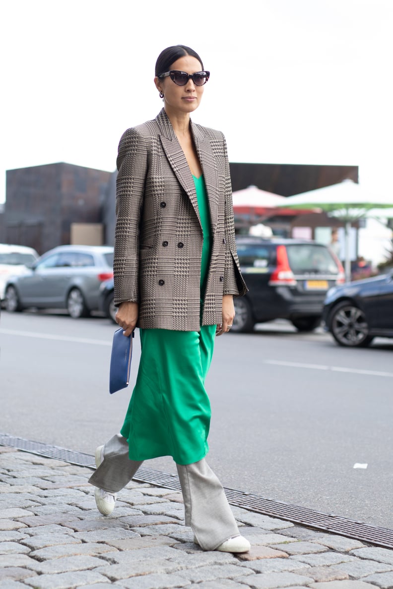 Top a silky slip dress with a plaid blazer for the office.