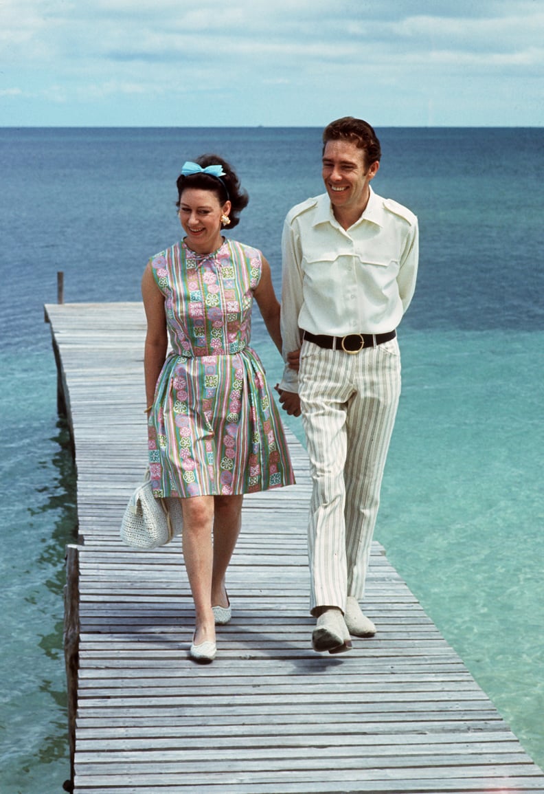 NASSAU, BAHAMAS - MARCH 14:  Princess Margaret, the younger sister of Britain's Queen Elizabeth II, walks 14 March 1967 with her husband Earl of Snowdon on a pontoon in the Bahamas. Princess Margaret and the Earl of Snowdon had two children, son Linley an