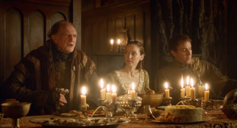 Walder sitting next to a terrified young bride at the Red Wedding