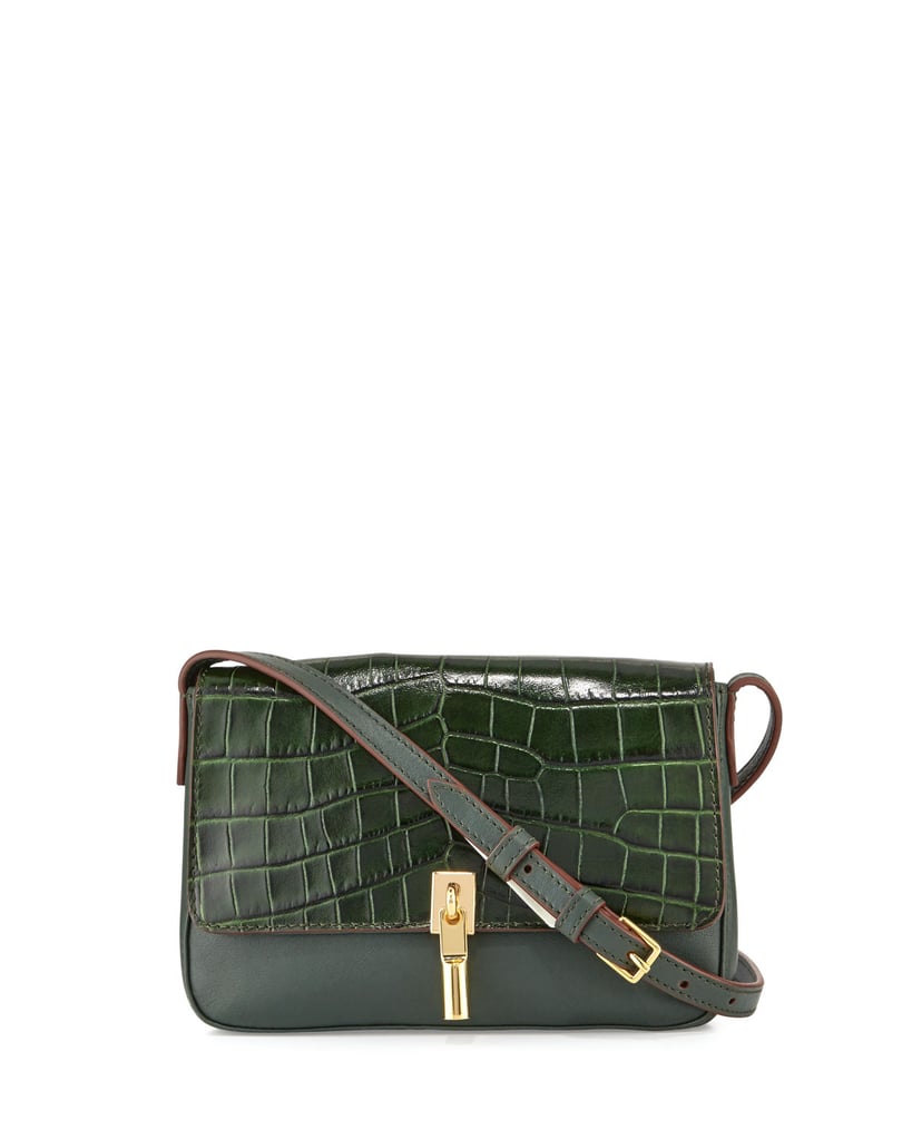 Croc-embossed bags were big on the runway, and this Elizabeth and James Cynnie Crocodile-Embossed Micro Crossbody Bag ($295) come in a deeply gorgeous emerald shade to up the ante.