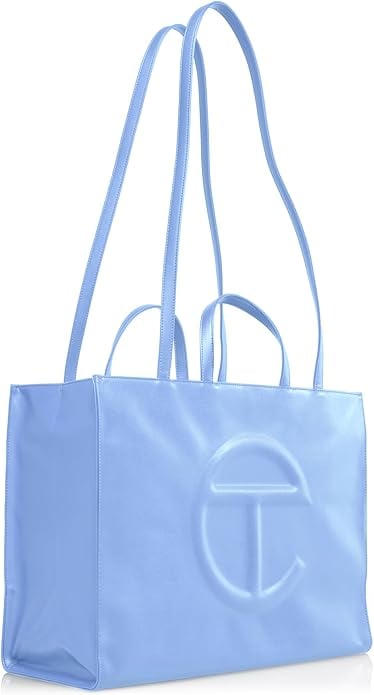 Telfar Large Shopping Bag ($272)
"Telfar's viral shopping bag is the gift my family and friends appreciate most. It's the perfect marriage of fashion and function as it can fit a laptop, along with all your essentials, and it comes in so many colors you're bound to find one that feels quintessentially you. It's available on Amazon now (thanks to Oprah's favorite things!) so pick one up while you can take advantage of the fast shipping." — Jessica Andrews, senior style director