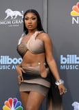 Megan Thee Stallion’s Ombré Miniskirt Comes With a Crystal-Adorned Hip Cutout