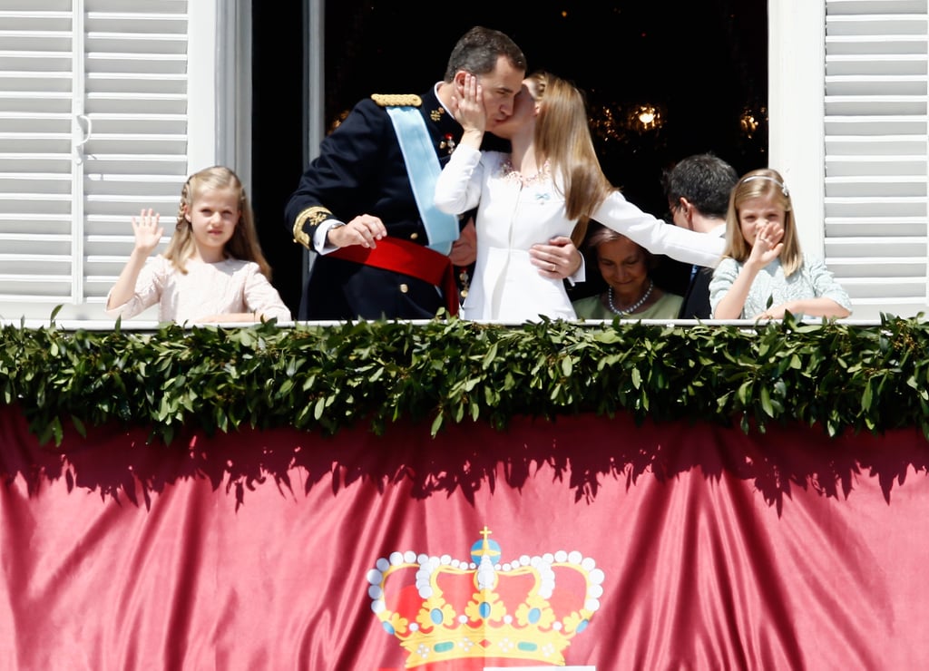 The newly crowned king and queen of Spain shared a kiss on the balcony of the royal palace in June 2014.