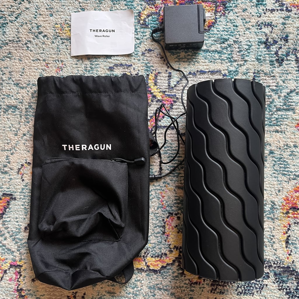 I've Been a Runner For 12 Years — This Vibrating Roller Helps Me Recover