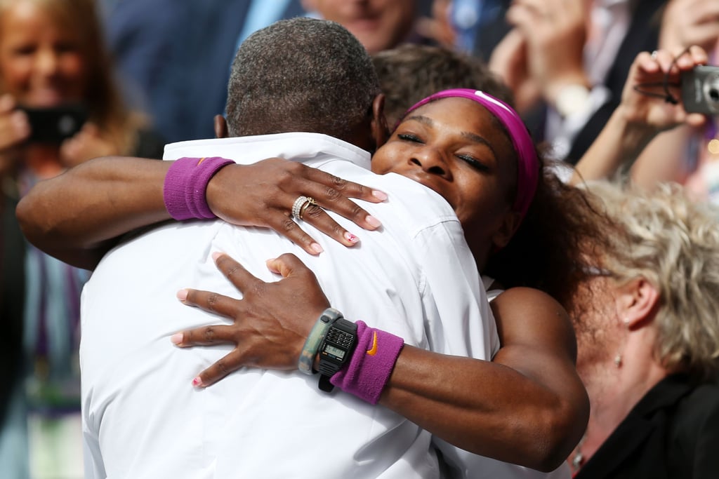 Serena and Richard Williams embracing at the 2012 Wimbledon Lawn Tennis Championships in London.