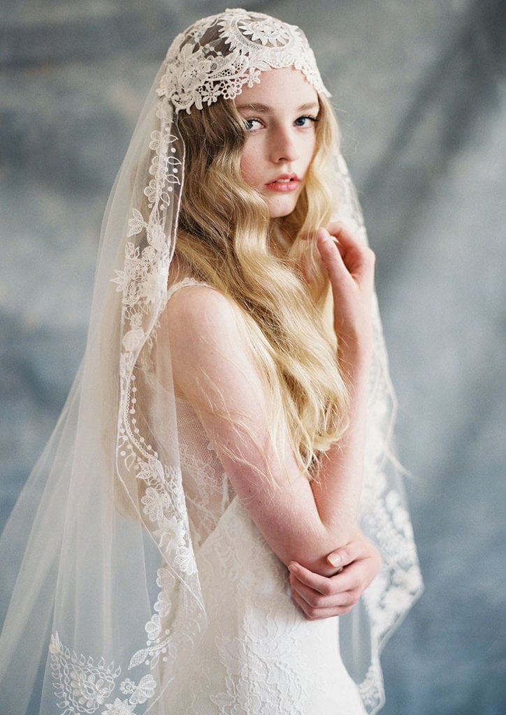 Cotton threadwork forms an organic motif of vines and leaves in this bohemian-style veil ($500).