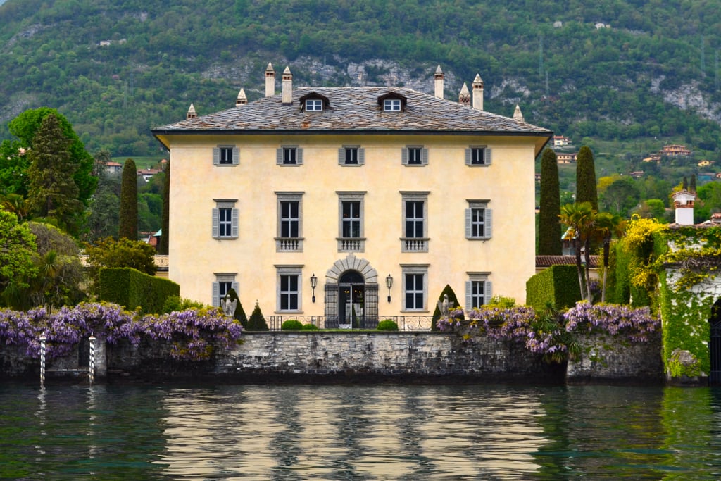 While you reveled in the fast-paced, familial drama of House of Gucci, starring Lady Gaga and Adam Driver, you'll likely agree one aspect of the film is perhaps more gripping than anything else: the breathtaking filming locations. As Patrizia Reggiani (played by Gaga) charms her way to becoming Maurizio Gucci's (played by Driver) wife, viewers are taken on a deep dive into the complicated inner workings of the Gucci family and the early roots of one of today's most recognizable high-fashion labels. Serving as the settings for the movie's most dramatic moments are some of the most beautiful locations in Italy, like the snow-covered mountains of the Cortina D'Ampezzo Ski Resort, Milan's Galleria Vittorio Emanuele, or the luxury Villa Balbiano.
Almost too stunning to be true, Villa Balbiano is, in fact, a real place. House of Gucci viewers get a glimpse of the villa when Patrizia first meets the Gucci family, and it's easy to lose track of the movie's plot with such a palatial backdrop. Situated on almost five acres of land on the shore of Italy's picturesque Lake Como, Villa Balbiano, part of The Heritage Collection's historic estates, was originally built in the 16th century and has since become the largest private residence on the body of water. The exterior is impossibly grand, surrounded by sprawling gardens and greenery, while the interior features ornate decor, an impeccable art collection, spacious suites, and antique furniture, all of which so perfectly encapsulate the sheer luxury associated with the Gucci empire.  
Surprisingly, Villa Balbiano isn't just a gorgeous set for a movie but also a fairy-tale setting for a variety of events, like weddings, parties, photo shoots, and more. In fact, you can rent Villa Balbiano directly on Airbnb or inquire about a reservation online, should you really want to indulge in the luxury of it all. The main building on the property boasts a whopping six suites, each designed with a different color aesthetic in mind, and villa guests have access to the first three floors of the building, according to the listing. Granted, such an enormous property comes with a hefty price tag — starting around $1,132 per night — but one look at this Italian treasure, and you'll understand why.
Ahead, get lost in photos of Villa Balbiano's interiors, exteriors, and more, and (virtually) live your dream of Italian luxury.

    Related:

            
            
                                    
                            

            Keep the Change, Ya Filthy Animal: Stay at the Home Alone House For Less Than the Cost of a Pizza